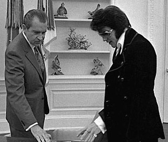 Elvis and Nixon find Paul's nutsack.
